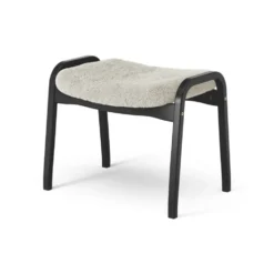 Lamino fotpall svartlaserad bok