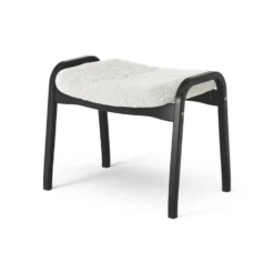 Lamino fotpall svartlaserad bok